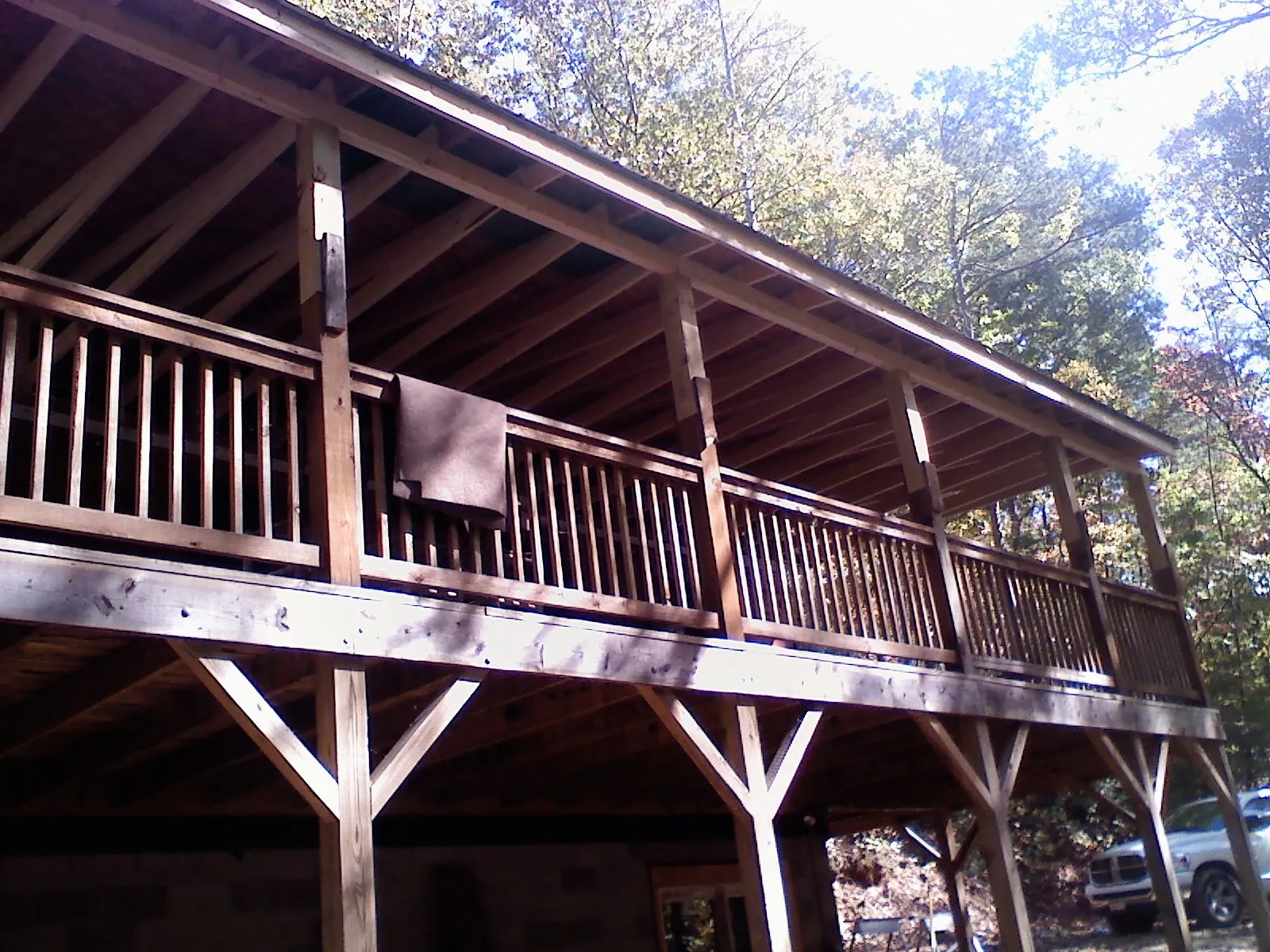 Timber framing under a new elevated porch and deck — Roof Leak Repair in Westfield Center by Roofing Brothers